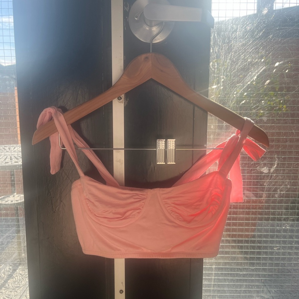 pink corset with bow shoulders